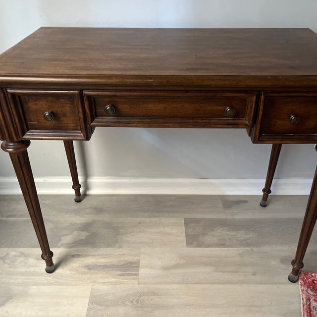 Eye catching vintage styled writing desk re Traditional rectangular writing desk featuring burnished edges and medium...
