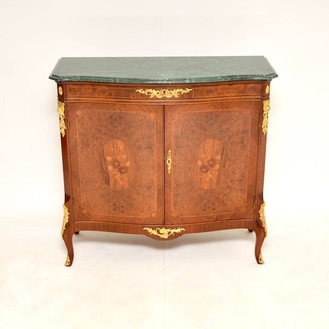 A beautiful antique French burr walnut marble top cabinet, this dates from around the 1930’s. It is of superb quality,...