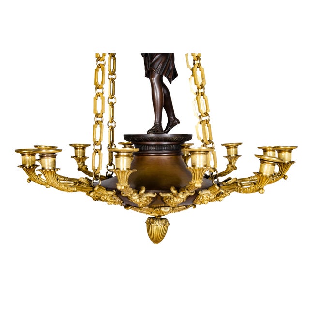 Finest quality with a ceiling cap of cast bronze original to the piece with four square link gilt bronze chains supporting...