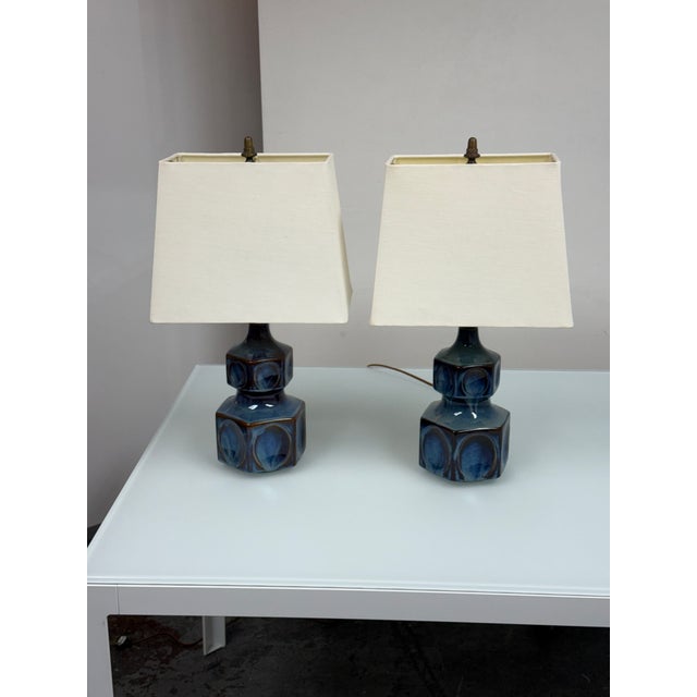 Design Plus Gallery presents a Pair of Vintage Ceramic Table Lamps by Einar Johansen for Søholm. The ceramic bases show...