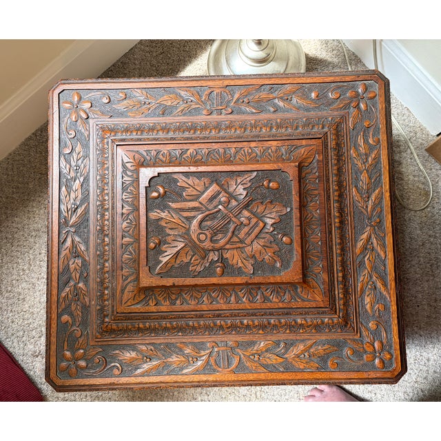 This beautifully carved music box is in almost perfect condition visually as well as working order. It also comes with 50...