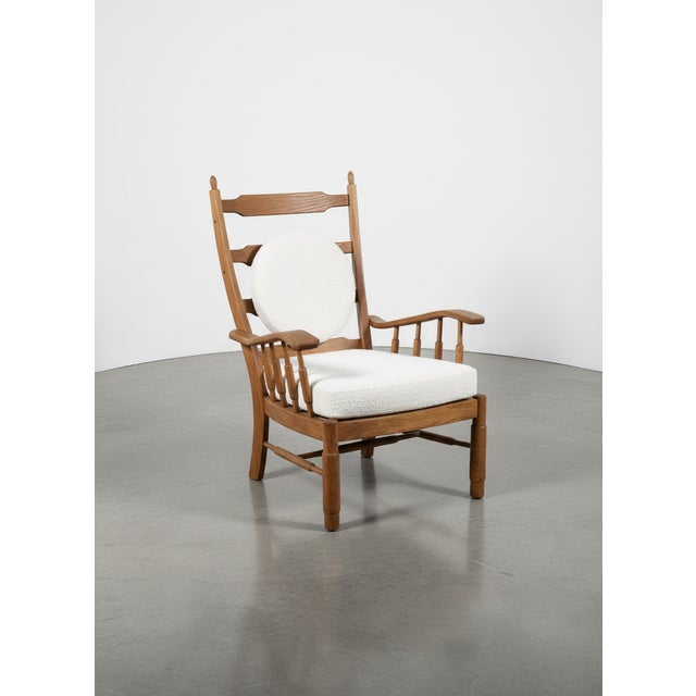 Pair of armchairs, in the style of Guillerme and Chambron, French work, circa 1950. Openwork frame with patinated oak...