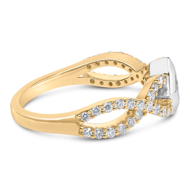 Imbued with sophistication and an intricate play of light, this exquisite ring blends 10K yellow and rhodium-plated white...
