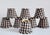 Set of 8 vintage black and beige check pattern chandelier lamp shades with brass clips-on. The shades are made of cotton...