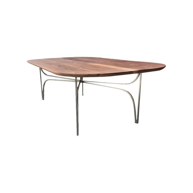 An elegant, custom-made coffee table by Moni Abbasi from Hudson & Scout, a bespoke woodwork and carpentry shop. It is...