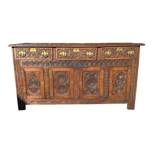 Antique Jacobean Revival Style Intricately Carved Oak Sideboard For Sale