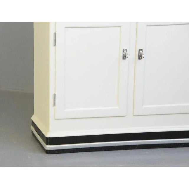 Dentists Cabinet 1930s 2440 Made from pine with cream paint - Toughened white glass top - Chrome handles - 12 drawers with...