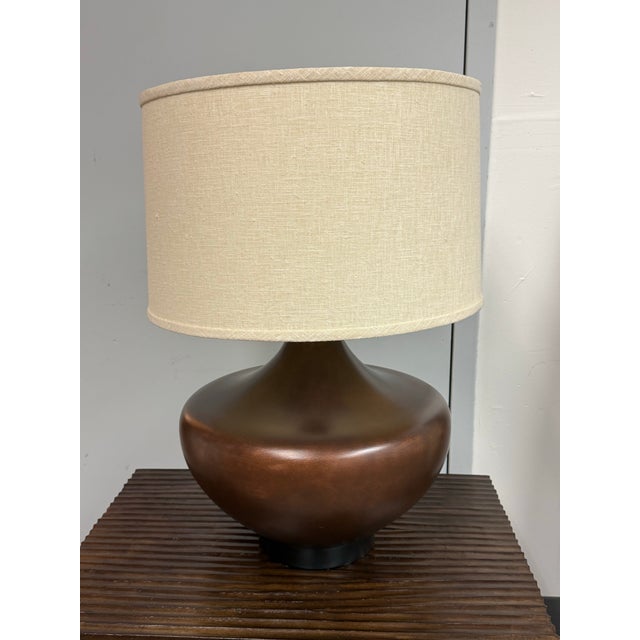 Design Plus Gallery presents a Ceramic Table lamp from Crate & Barrel. The lamp has a rounded sculptural body with a...