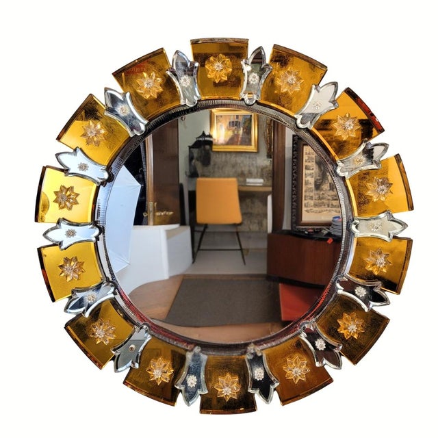 Amazing and playful sunburst mirror in beveled murano glass, italy. its circular design features alternating pieces of...