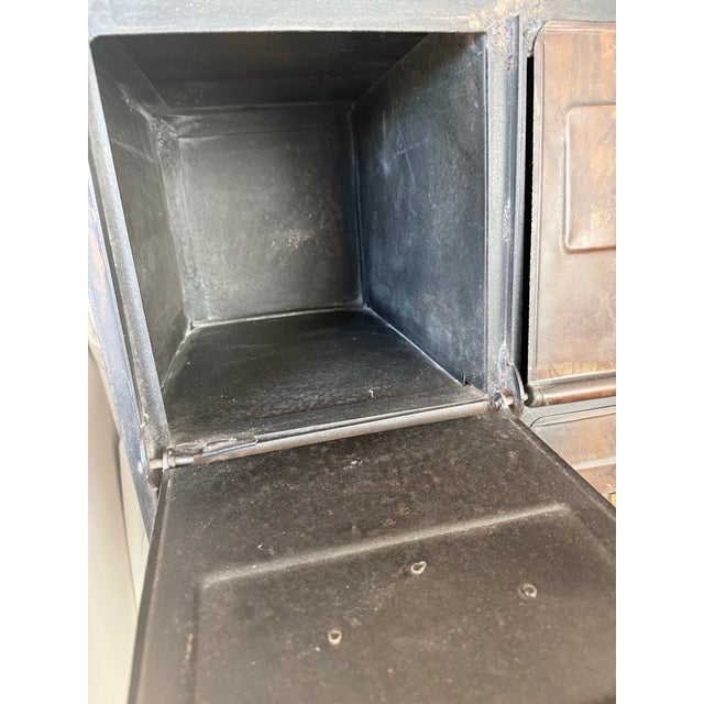 A rare and authentic 1930s French industrial “klappet” cabinet, attributed to Strafor (Forges de Strasbourg), featuring 15...