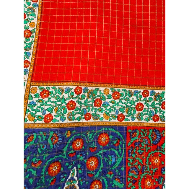 YVES SAINT LAURENT Large Scarf 1970 This large scarf features a vibrant red center and green and blue arabesque patterns...