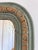 An elegant antique French Louis Philippe mirror dating from the late 19th century. This mirror features original mercury...