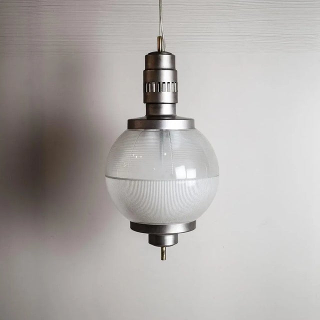 Chromed Satin Aluminum Suspension Lamp by Sergio Mazza, 1960s, in Good conditions. Designed 1960 to 1969 This piece is...
