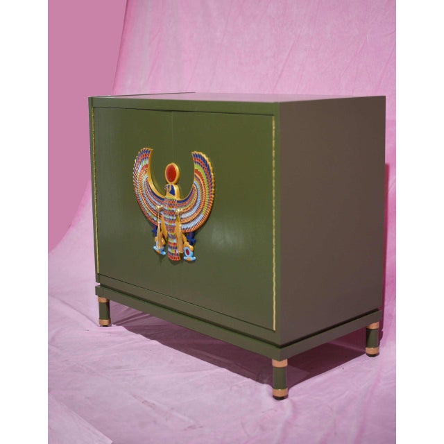 This unique Two Door Chest is handcrafted. The cabinet has 2 doors with Horus, the Egyptian bird god, representing the...