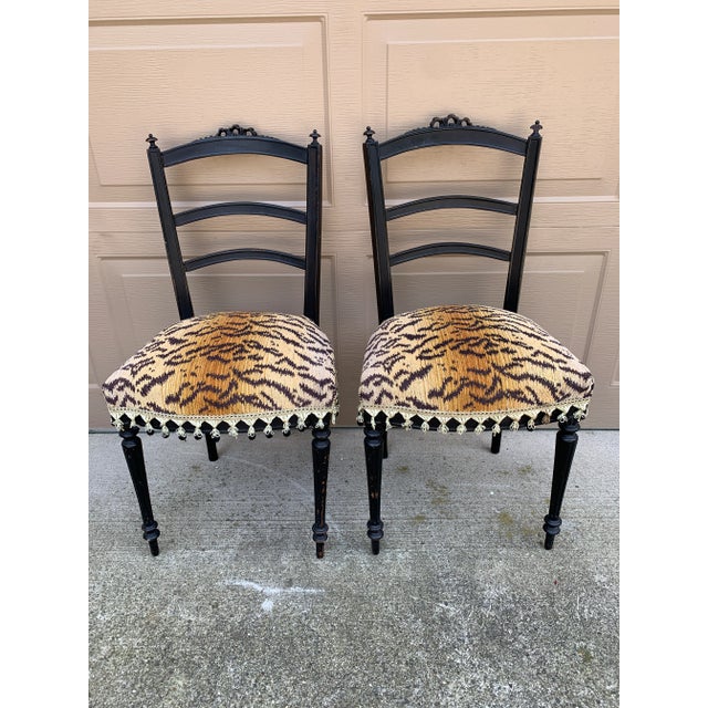 An unexpected marriage of old-world elegance and playful sophistication, this pair of late 19th century Empire opera...