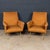 A refined pair of Italian Mid-Century Modern lounge chairs dating from the 1950s or 60s, a period defined by elegance,...
