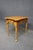 Ethan Allen maple side table with a shaped and scalloped top, single drawer, scalloped apron, and tapered legs with pad...