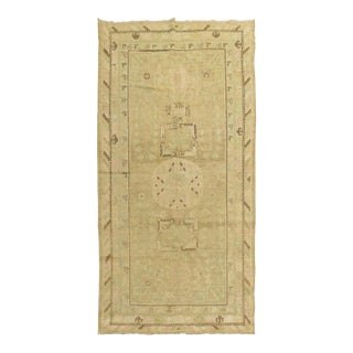 Pastel Antique Khotan Rug with Camel Background For Sale