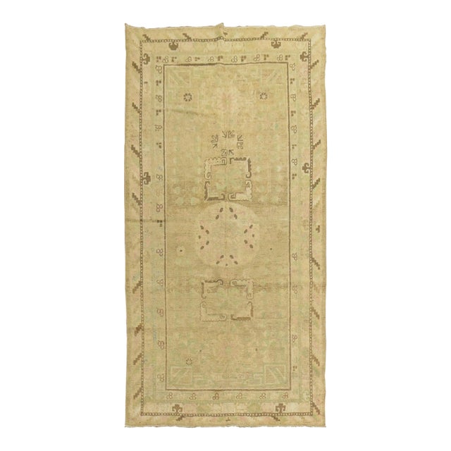 Pastel Antique Khotan Rug with Camel Background For Sale