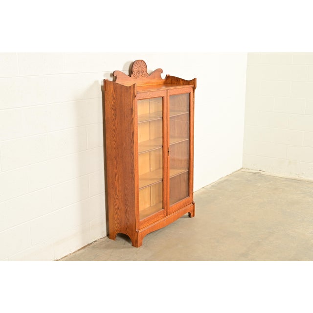 Victorian Antique Victorian Carved Oak Two-Door Bookcase Cabinet | Circa 1920s For Sale - Image 3 of 13