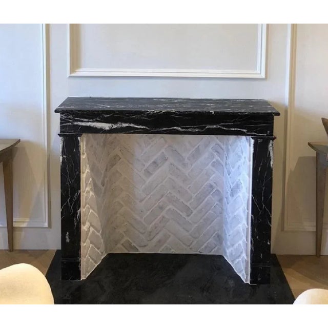 19th century Beligan Louis Phillippe period fireplace surround (mantel) in dark grey Saint Anne marble. Additional...