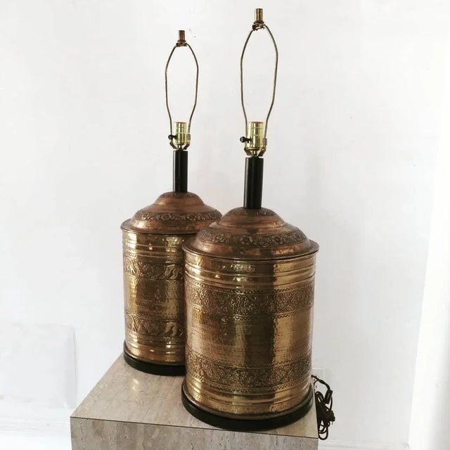 This amazing set are from the 50s era. They are with brass and wood base. One has elephants design and the other has leafs...