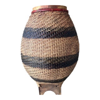 Circa 1990 Bombay Company Nicely-Sized Rattan Cylinder Vase on Wooden Pedestal For Sale