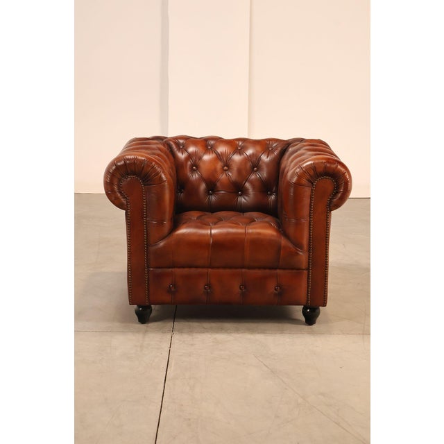 High Quality Tufted Brown Leather Lounge Chair with Brass Tack Trim, Mounted on Turned Feet