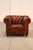 High Quality Tufted Brown Leather Lounge Chair with Brass Tack Trim, Mounted on Turned Feet