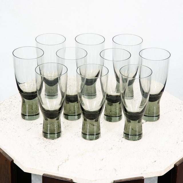 Lot of 10 smoked grey highball or juice glasses by Per Lutken for Holmegaard . We obtained these from a 1960s estate and...