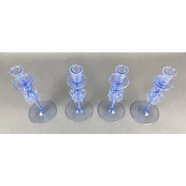 Four handmade Italian murano style glass from Venice candle sticks. Beautifully made and lovely shade of blue. One...