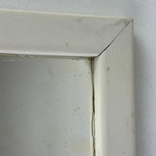 The beauty of this straightforward wooden mirror is in its simplicity on the one side, and the distressed mirror part on...