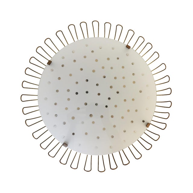 Beautiful and unique mid century modern sunflower ceiling and wall light with a glass cover plate with transparent dots,...