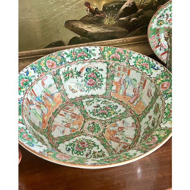 A substantial Chinese Export porcelain rimmed bowl or basin decorated in the Rose Medallion palette with alternating...
