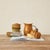 Ceramic pumpkin shaped butter - bree cheese dish. 6" Round x 5"High. Made of stoneware and reactive glaze. Orange Color,...