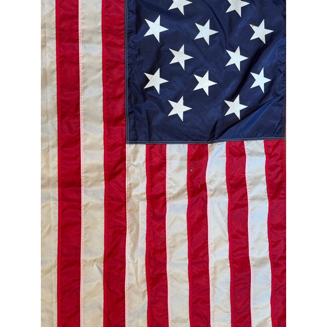 This is a late 20th century vintage United States flag. It represents the identity, freedom and history of the country. It...