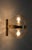 Space Age-style wall lamps by Peill & Putzler, made in Germany in the 1960s. Characterized by this geometric double-capped...
