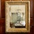 A beautifully ornamented ca. 1900 wall mirror with lots of detail rendered in gold leafed gessoed composition. The frame...