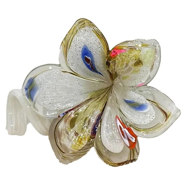 Stunning Murano blown glass decorative paperweight flower with curling stem. Use as a paperweight or anywhere that you...