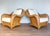 A gorgeous pair of wonderfully sculptural rattan and bamboo armchairs in lovely vintage condition. Likely made in france...