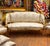 Bring timeless French elegance into your home with this beautiful Louis XV-style sofa, upholstered in a refined white and...