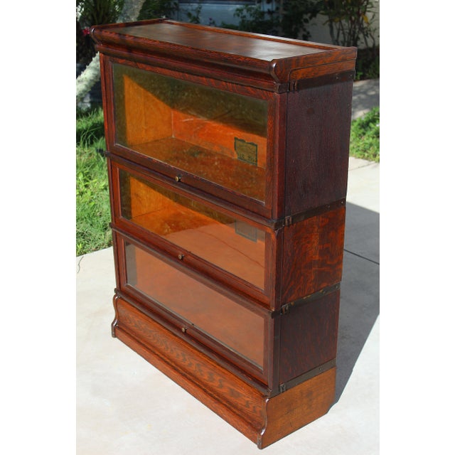 1910s Antique Globe-Wernicke 3-Tier Tiger Oak Barrister Bookcase – Grade 299 For Sale - Image 5 of 17