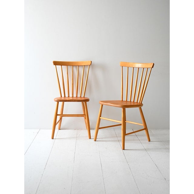 Pair of vintage chairs model Pinstolar, Scandinavian mid-century design with rounded slats and solid wood seat. Pair of...