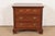 A beautiful Georgian or Chippendale style nightstand or bachelor chest of drawers By Baker Furniture USA, Circa 1980s...