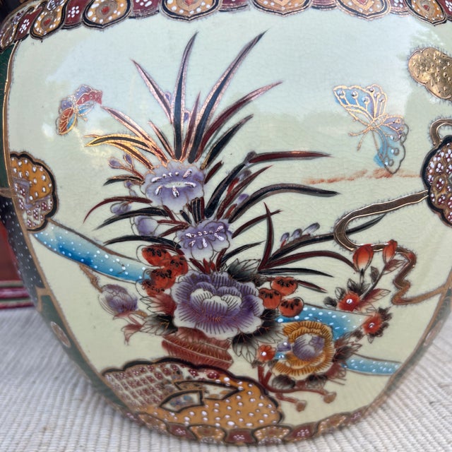 Vintage Chinese Porcelain Jardiniere Planter, Circa 1970's Made in China, circa 1970's Hand painted floral and butterfly...