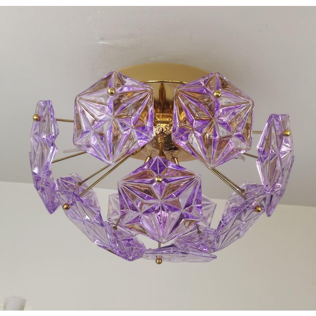 Elevate your space with this striking Mid-Century Modern Sputnik chandelier, designed with meticulous detail and timeless...