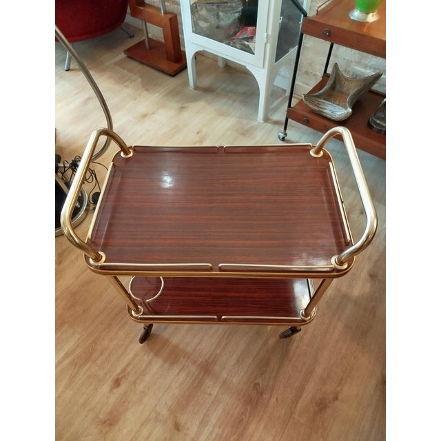 Practical and lightweight bar cart from the 1960s. Very easy to move. A mid-century touch for the home.