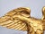 Antique Gold Metal American Eagle Sculpture This eagle sculpture is made of metal with a gold-toned finish. The back can...