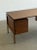 W59 D29.5 H28.25 KW2 KC27 Fully restored teak desk in great condition. Item is structurally sound , feature a new dark...