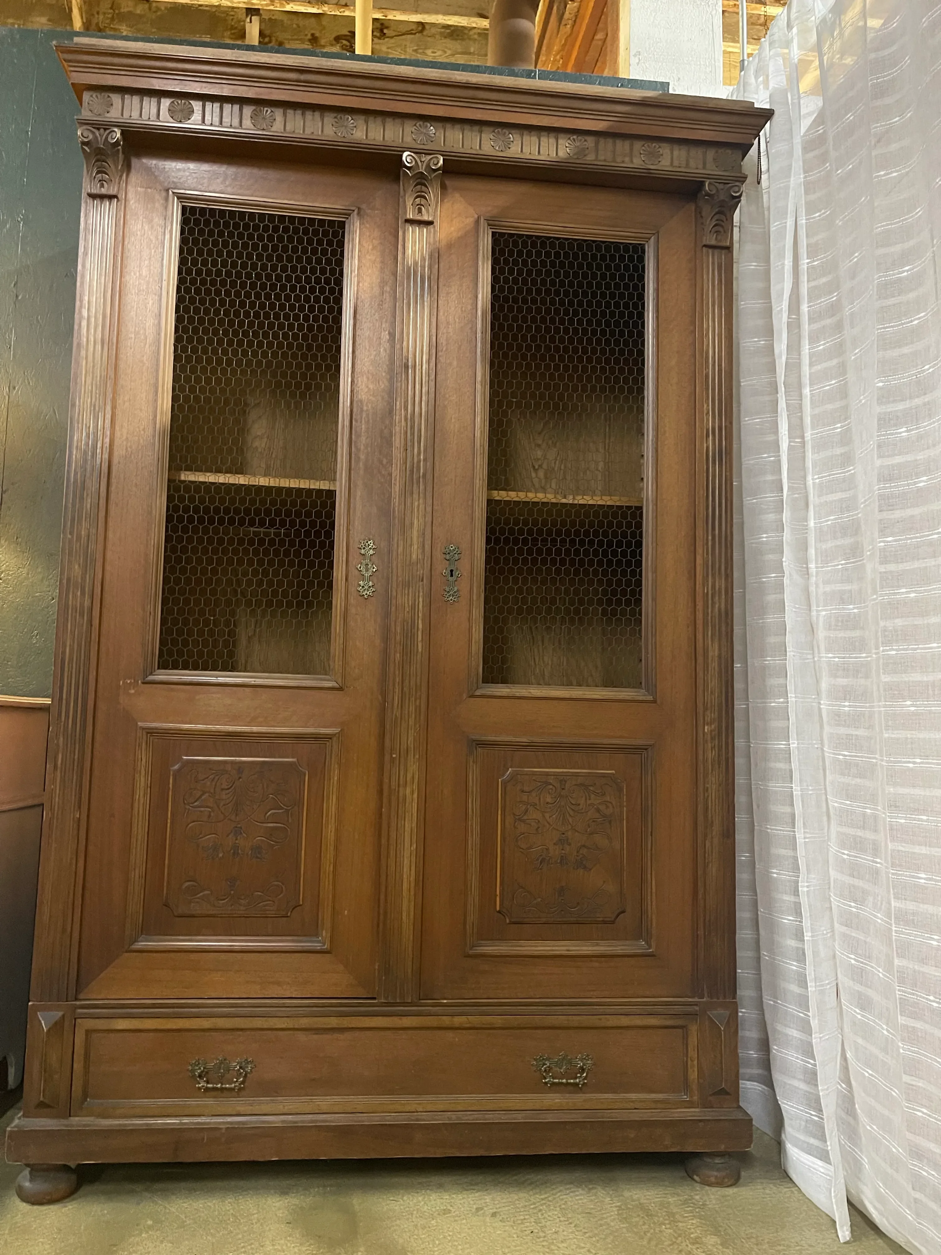 Antique Carved Lighted French Oak Cabinet With Wire Mesh Doors